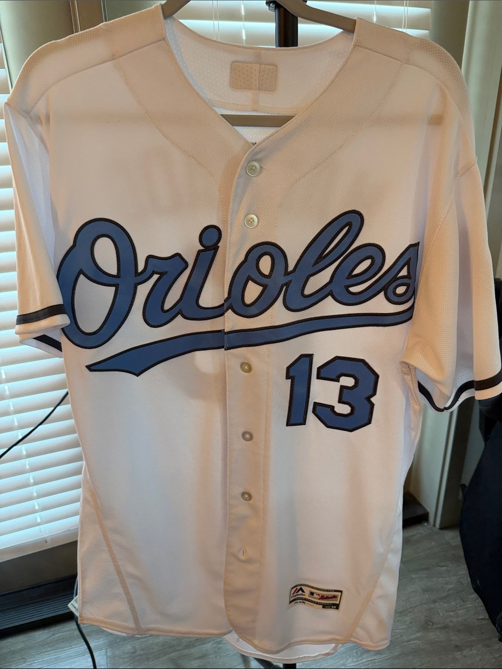 Majestic White Orioles Jersey with Light Blue Script & Navy Trim